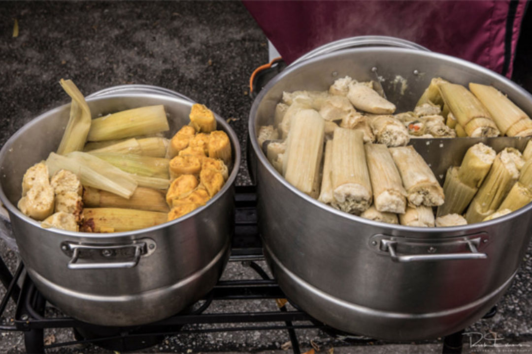 Image of two pots of tamales. - Photo by Rick Evans